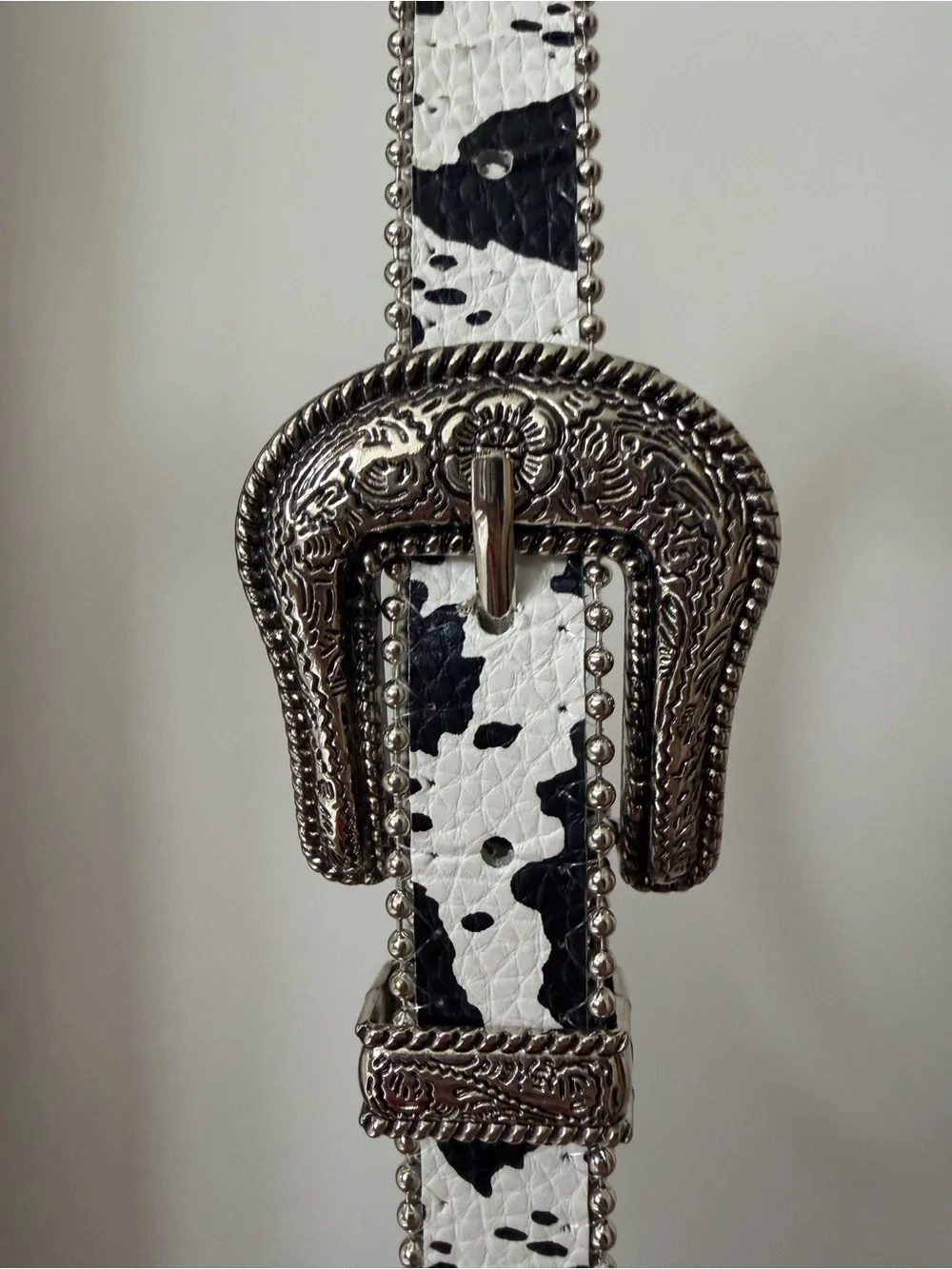 Western-Style Black and White Cow Print Belt with Silver Buckle